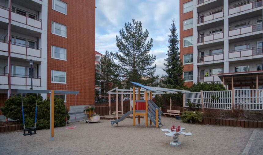 Picture of building from outside with playground